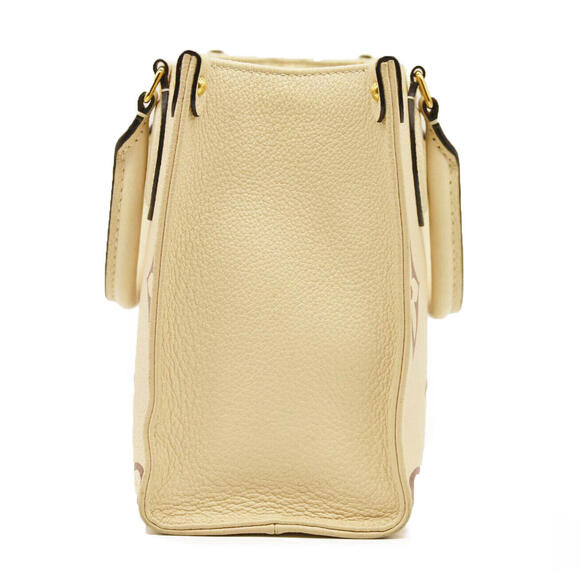 Louis Vuitton Empreinte Monogram Giant Onthego PM Creme - Picture 15 of 15